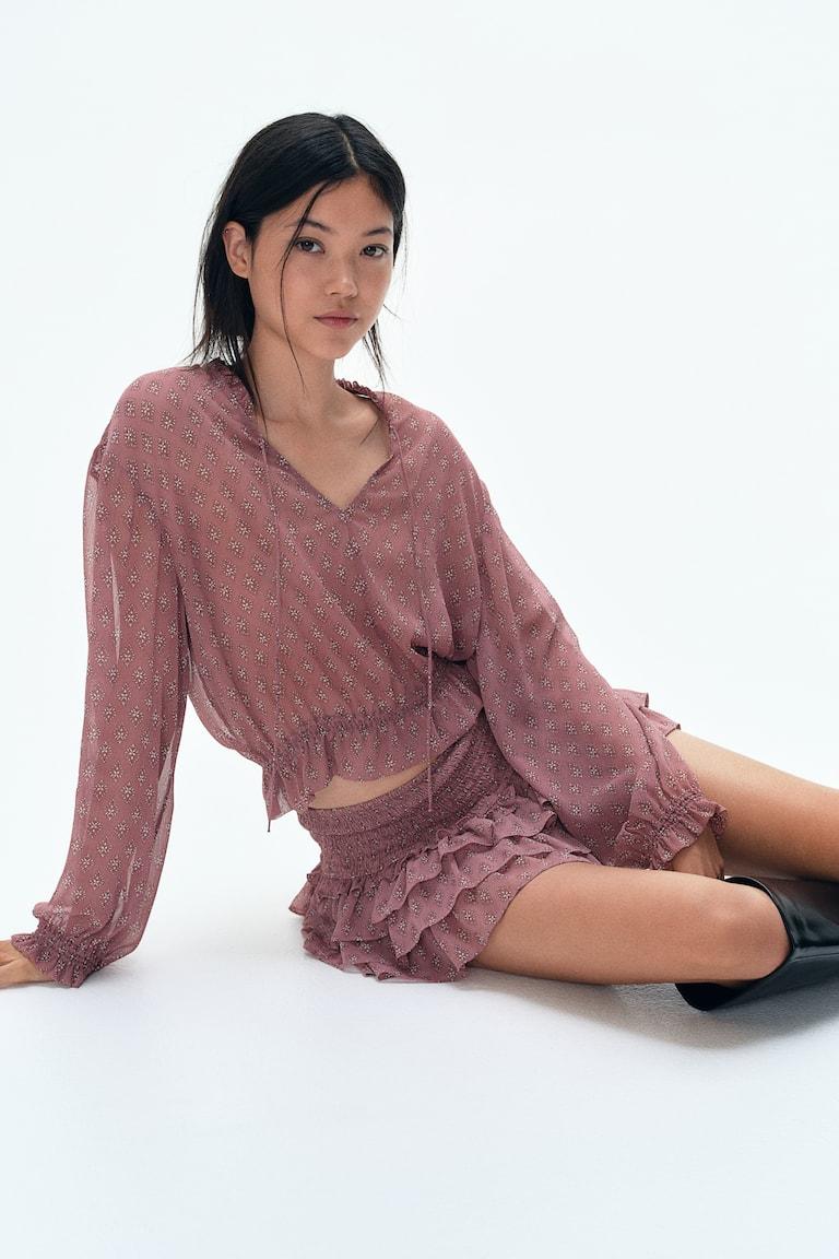 H&M Minirock mit Stufen Speichern exportieren