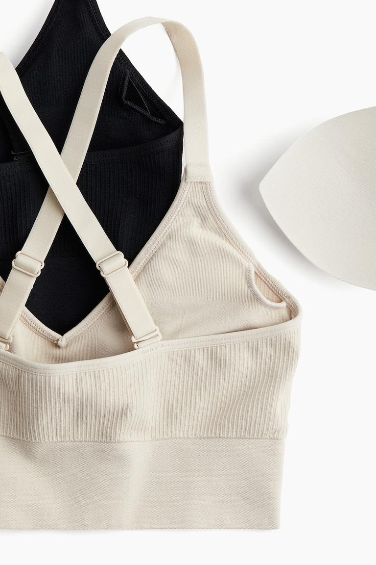 H&M 2er-Pack Sport-BHs aus DryMove™ Medium Support Kostenlose Rückgabe