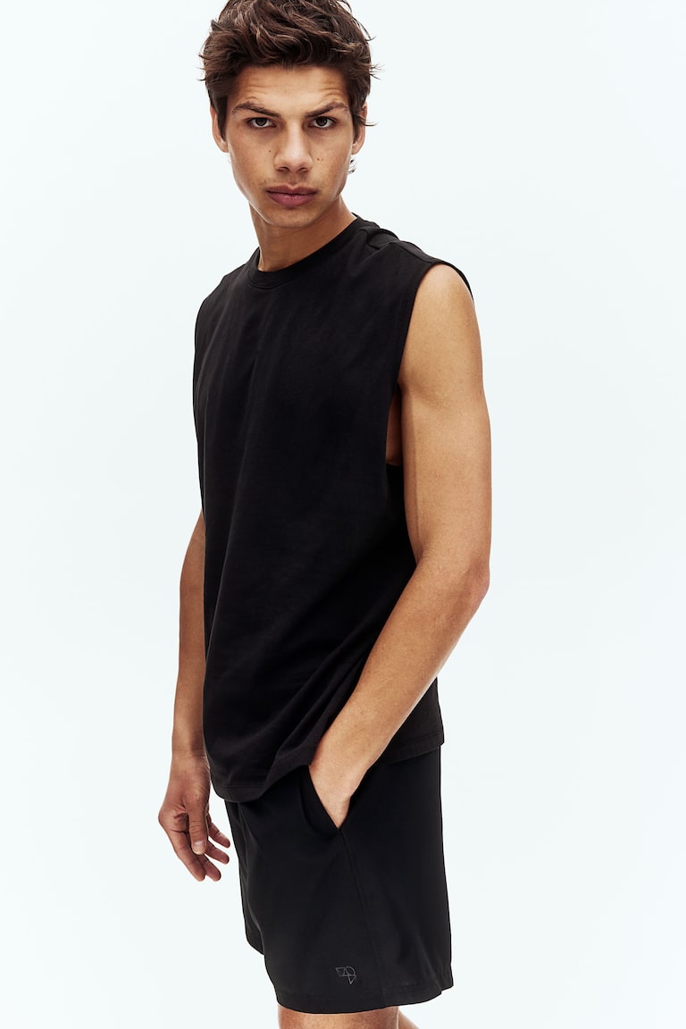 H&M Halblange Sportshorts mit DryMove™ 50% Rabatt mit kostenlosem Versand