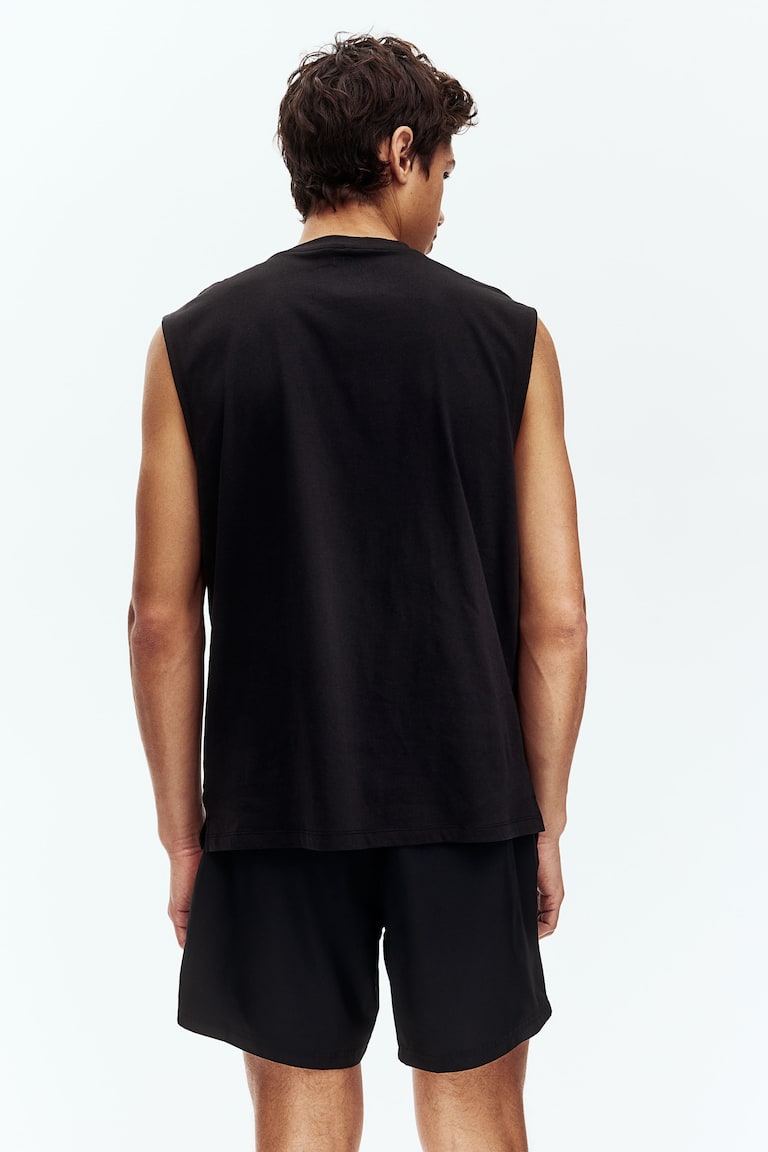 H&M Halblange Sportshorts mit DryMove™ 50% Rabatt mit kostenlosem Versand