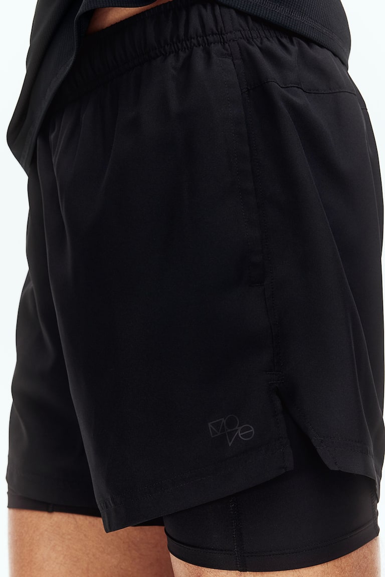 H&M Doppellagige Sportshorts mit DryMove™ Rabatte dieses Monats