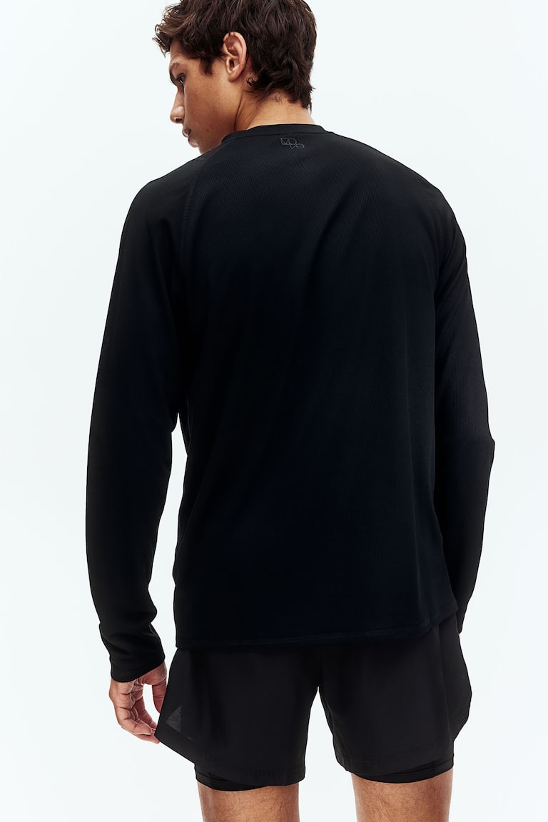 H&M Doppellagige Sportshorts mit DryMove™ Rabatte dieses Monats