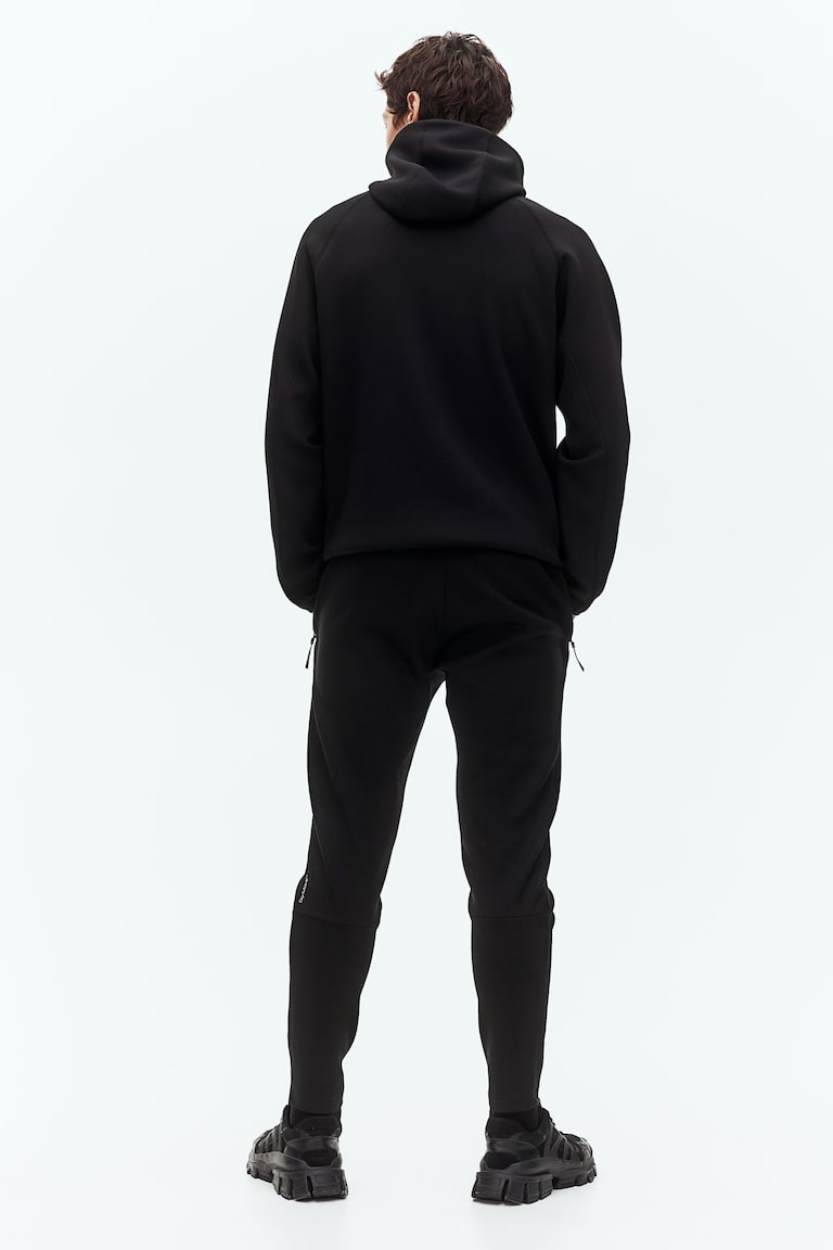 H&M Sport-Joggpants mit DryMove™ in Slim Fit Blitzverkäufe