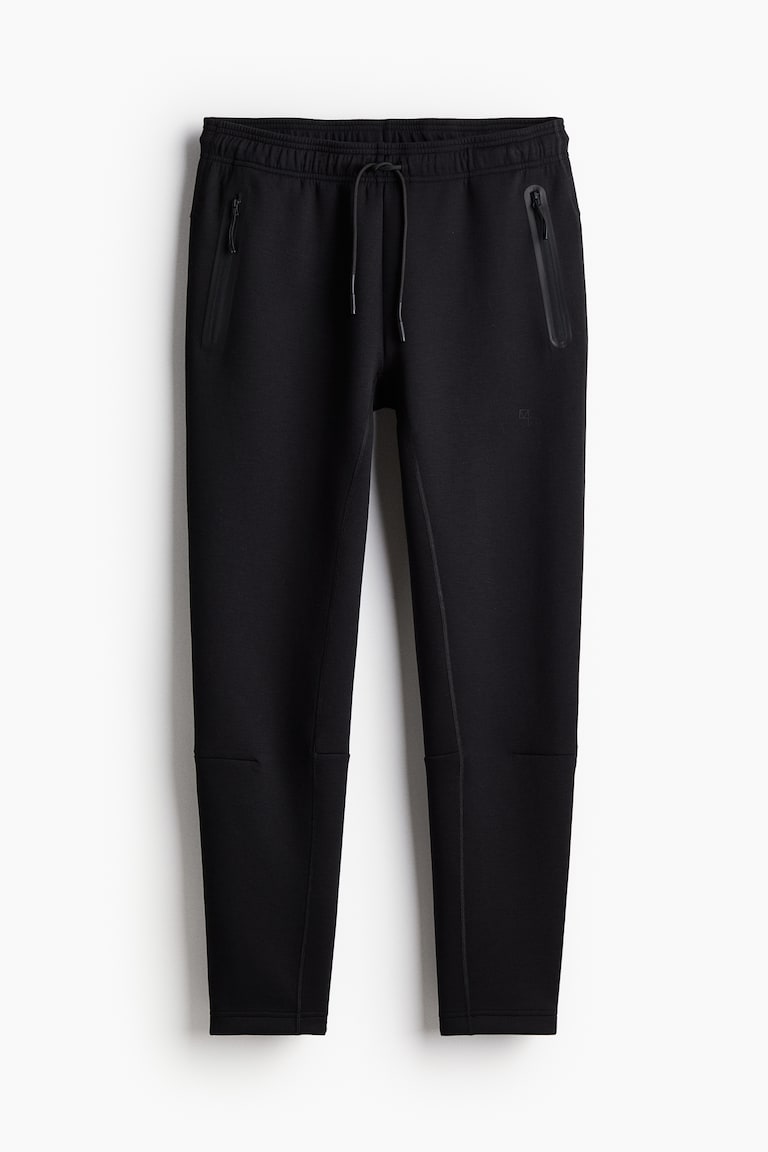 H&M Sport-Joggpants mit DryMove™ in Slim Fit Blitzverkäufe