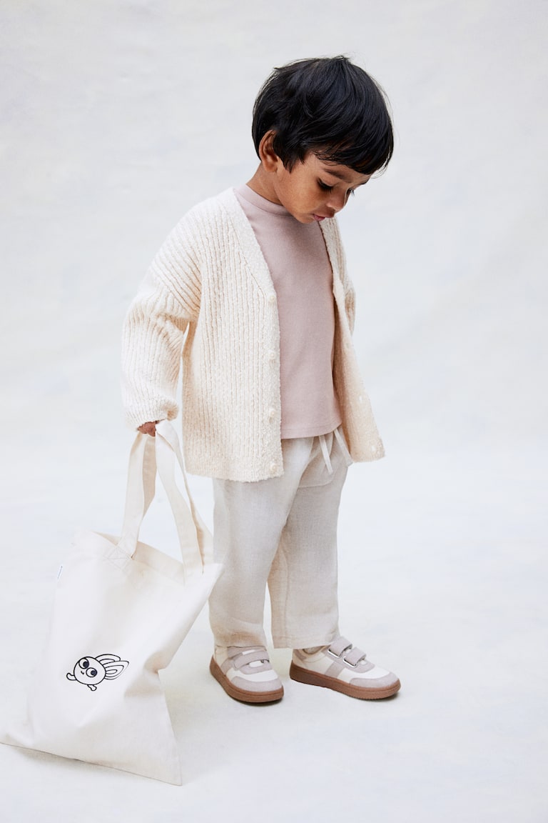 H&M Oversized Cardigan aus Boucléstrick Riesige Rabatte