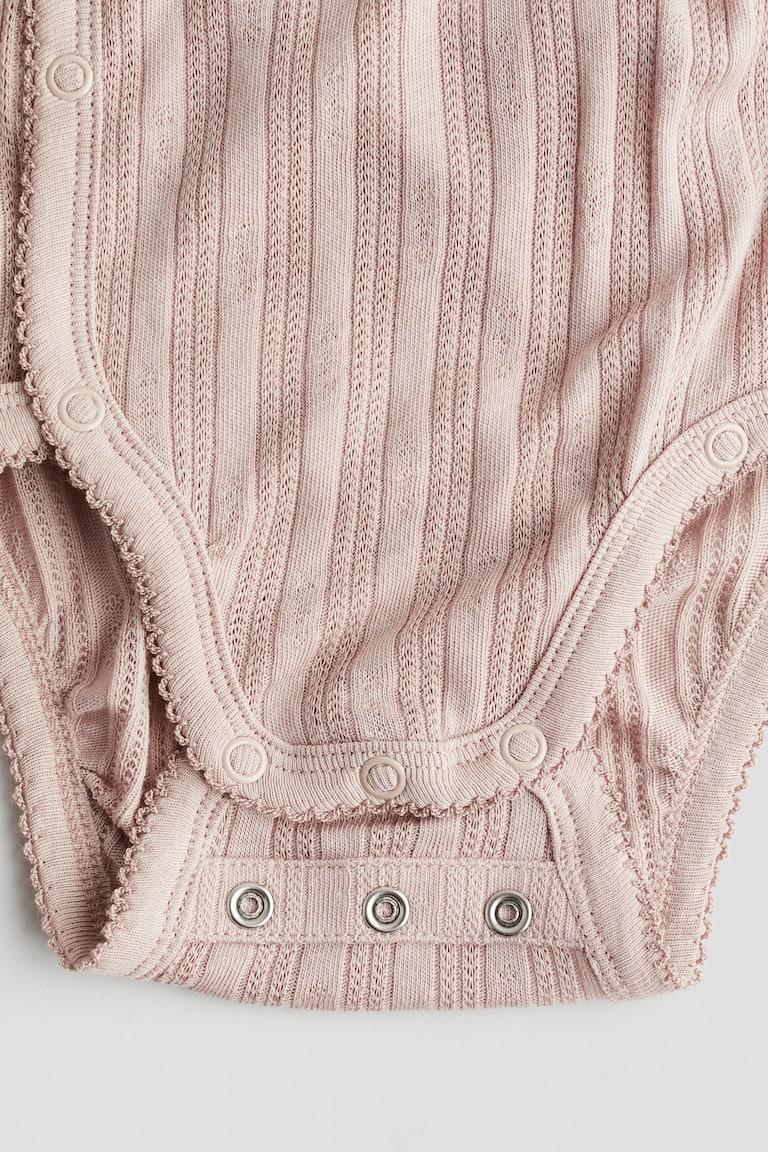 H&M Jerseybody mit Pointellemuster Speichern exportieren