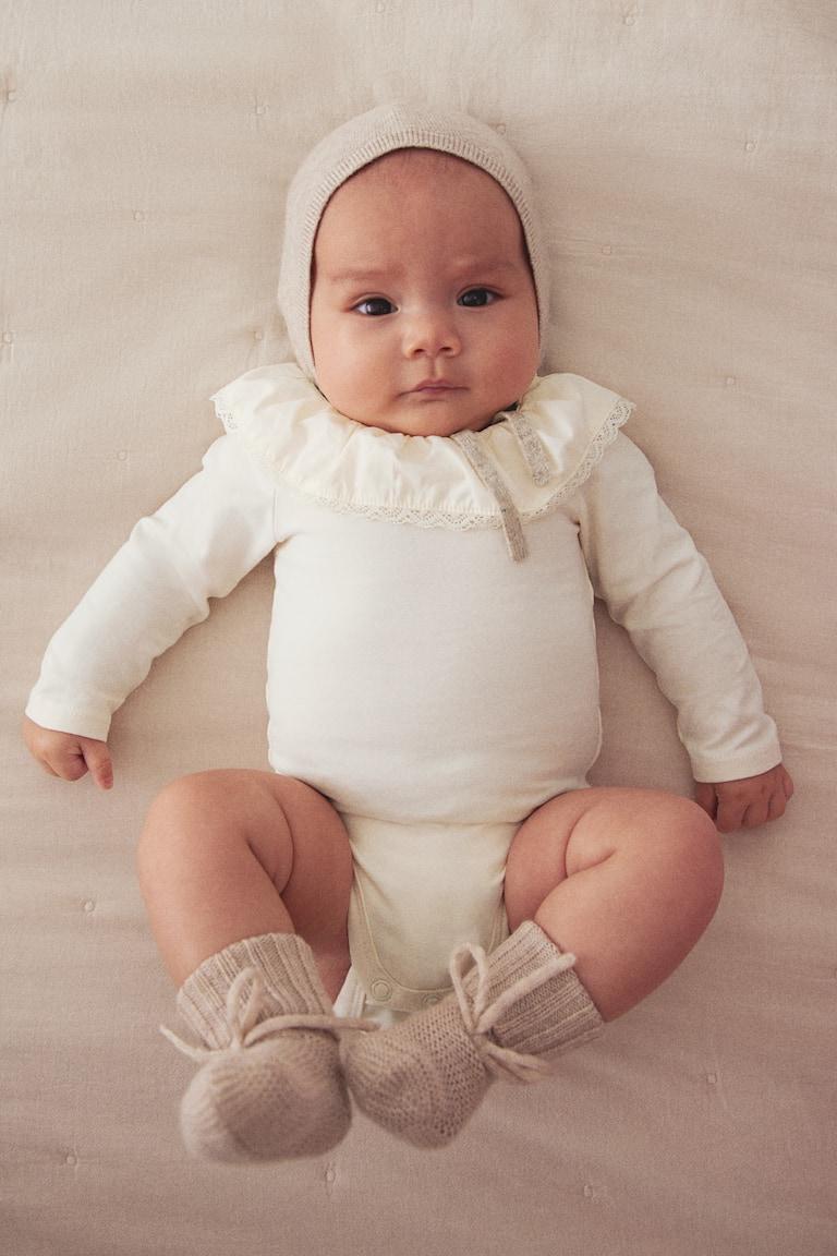 H&M Body mit Volantkragen