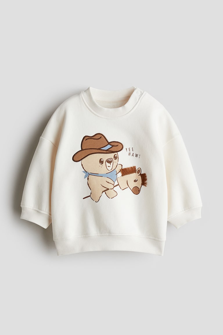 H&M Sweatshirt mit Motiv Jubiläumsangebot