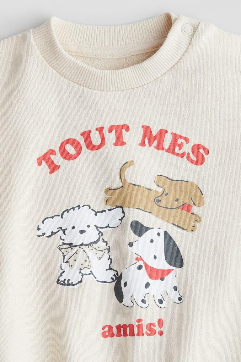 H&M Baumwollsweatshirt mit Print Begrenzte Freigabe