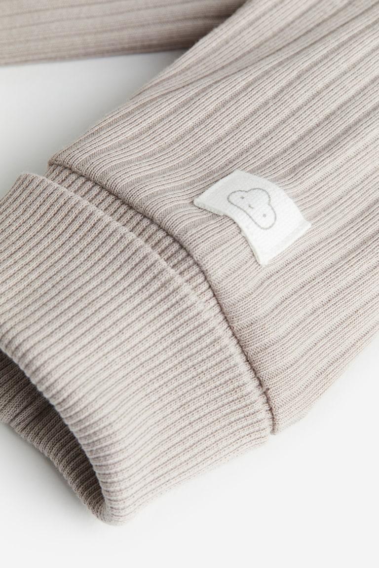 H&M Mitwachsender Strampler Kostenloser Versand international