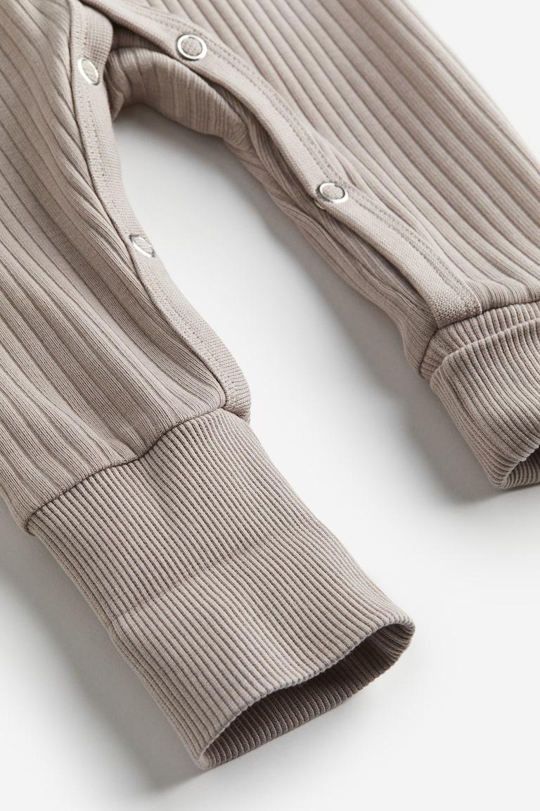 H&M Mitwachsender Strampler Kostenloser Versand international