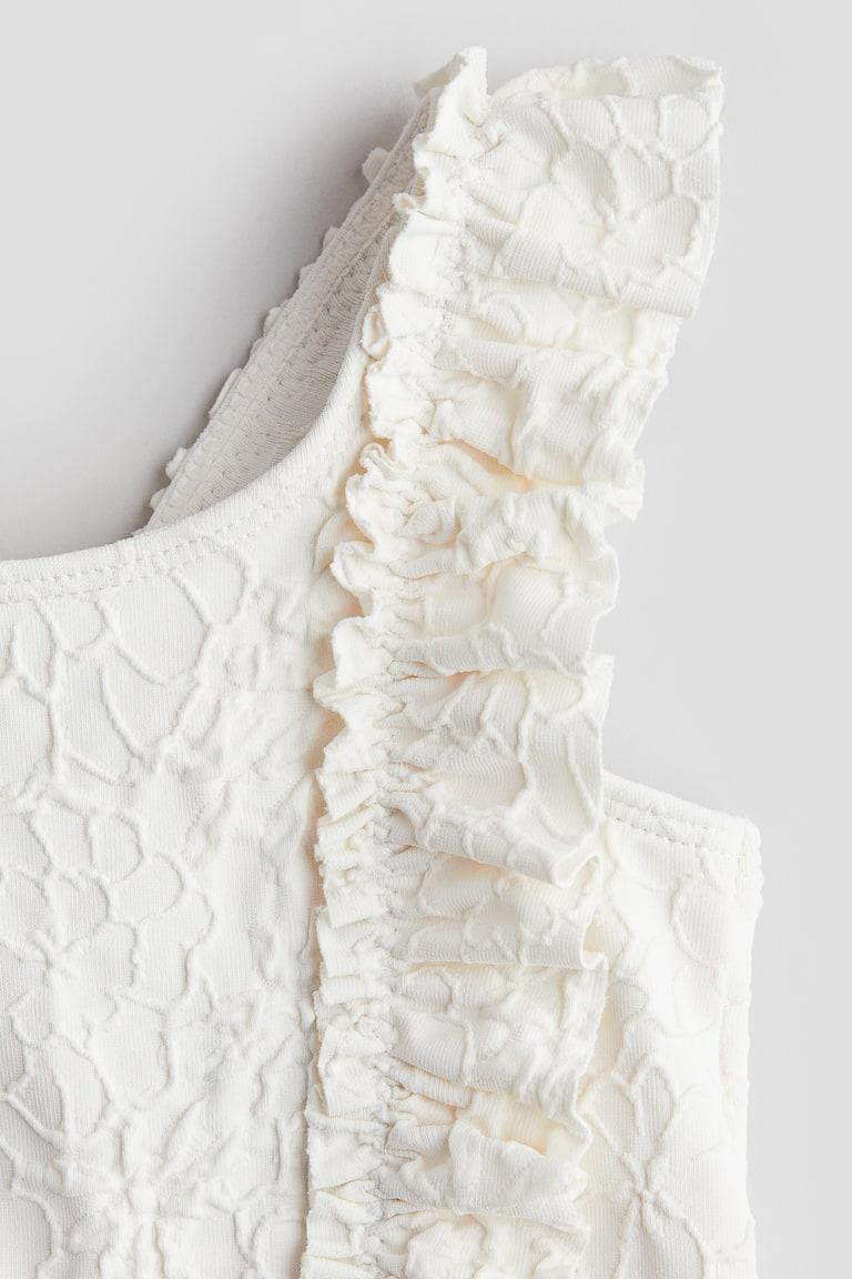 H&M Badeanzug mit Volants Neueste Stile