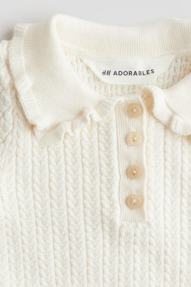 H&M Baumwollshirt aus Zopfstrick Discount Store für neue Produkte