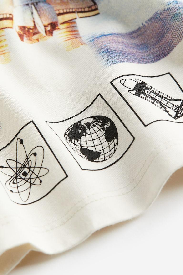 H&M T-Shirt mit Print Preisnachlass