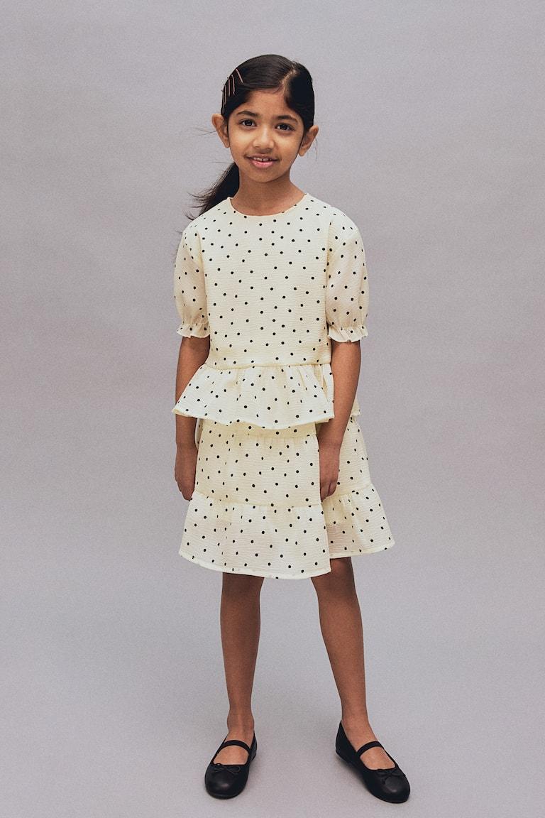 H&M Peplumbluse Sonderangebote