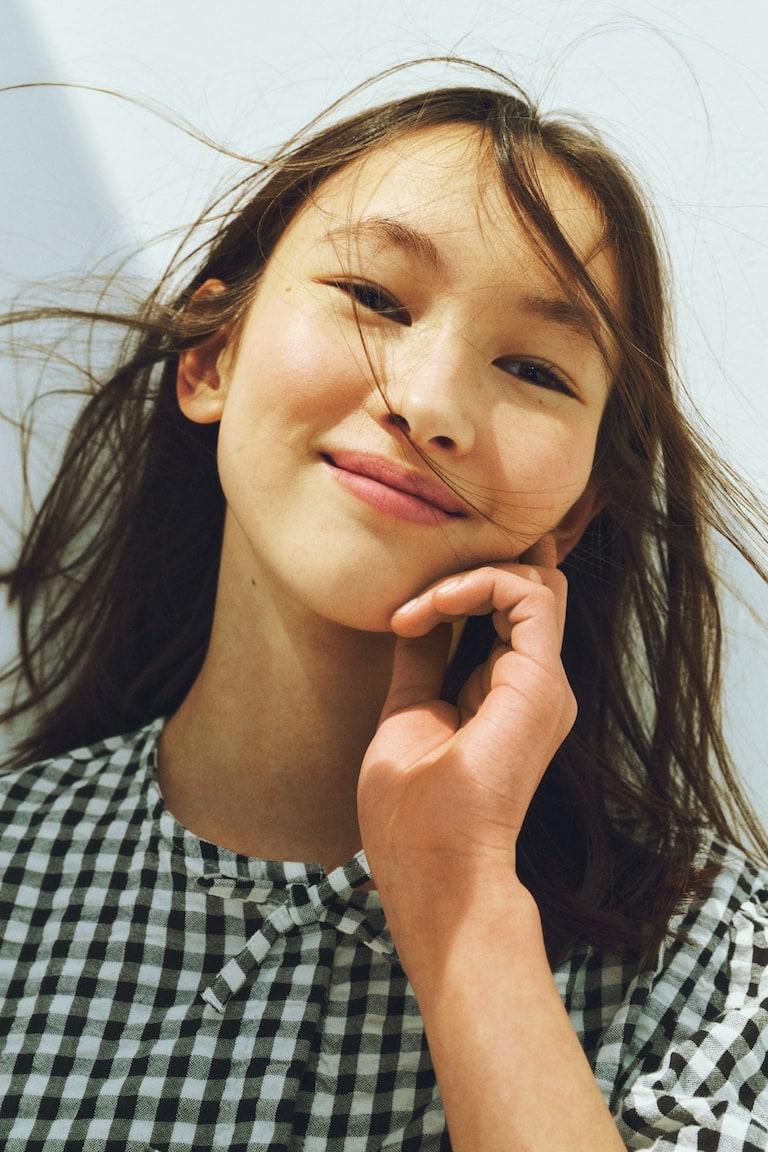H&M Peplumbluse aus Baumwoll-Seersucker Bis zu 65% Rabatt