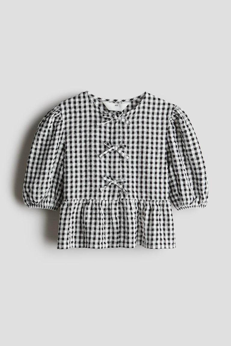 H&M Peplumbluse aus Baumwoll-Seersucker Bis zu 65% Rabatt