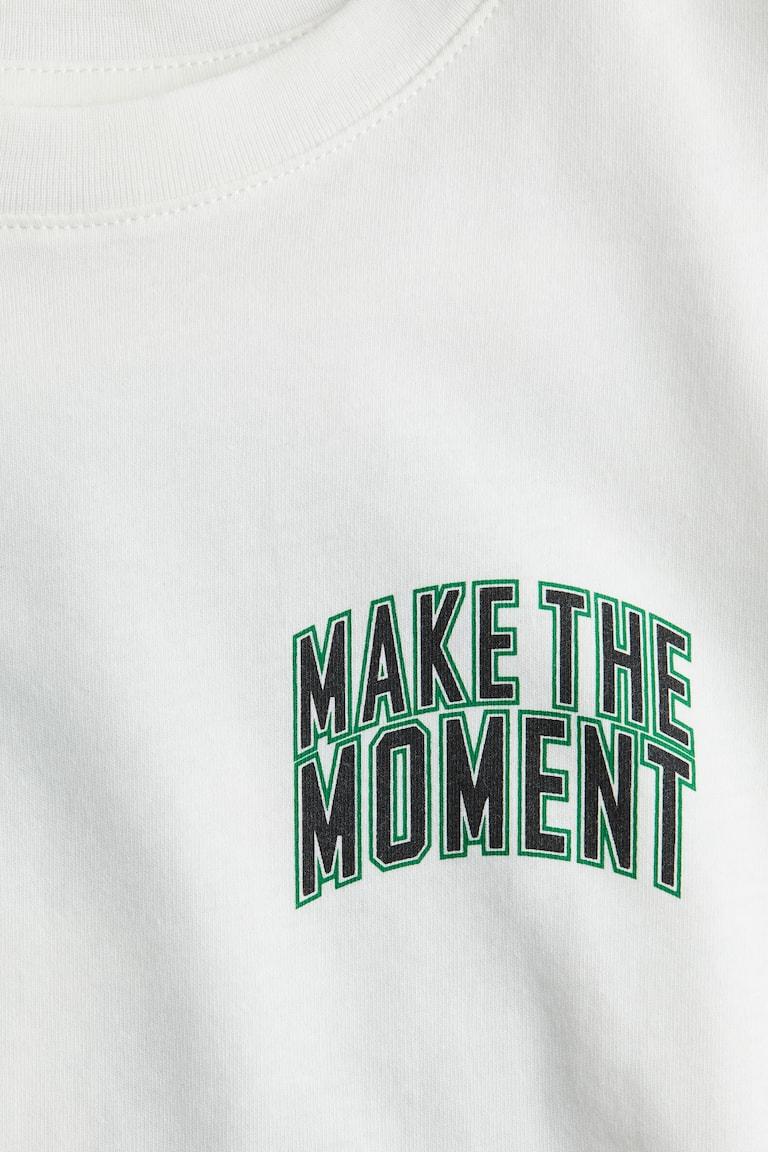 H&M T-Shirt mit Print Fabrikverkauf