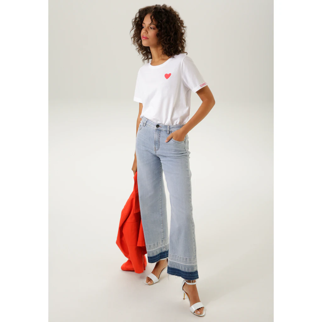 Aniston CASUAL Straight-Jeans mit trendiger Waschung am leicht ausgefranstem Saum im Angebot